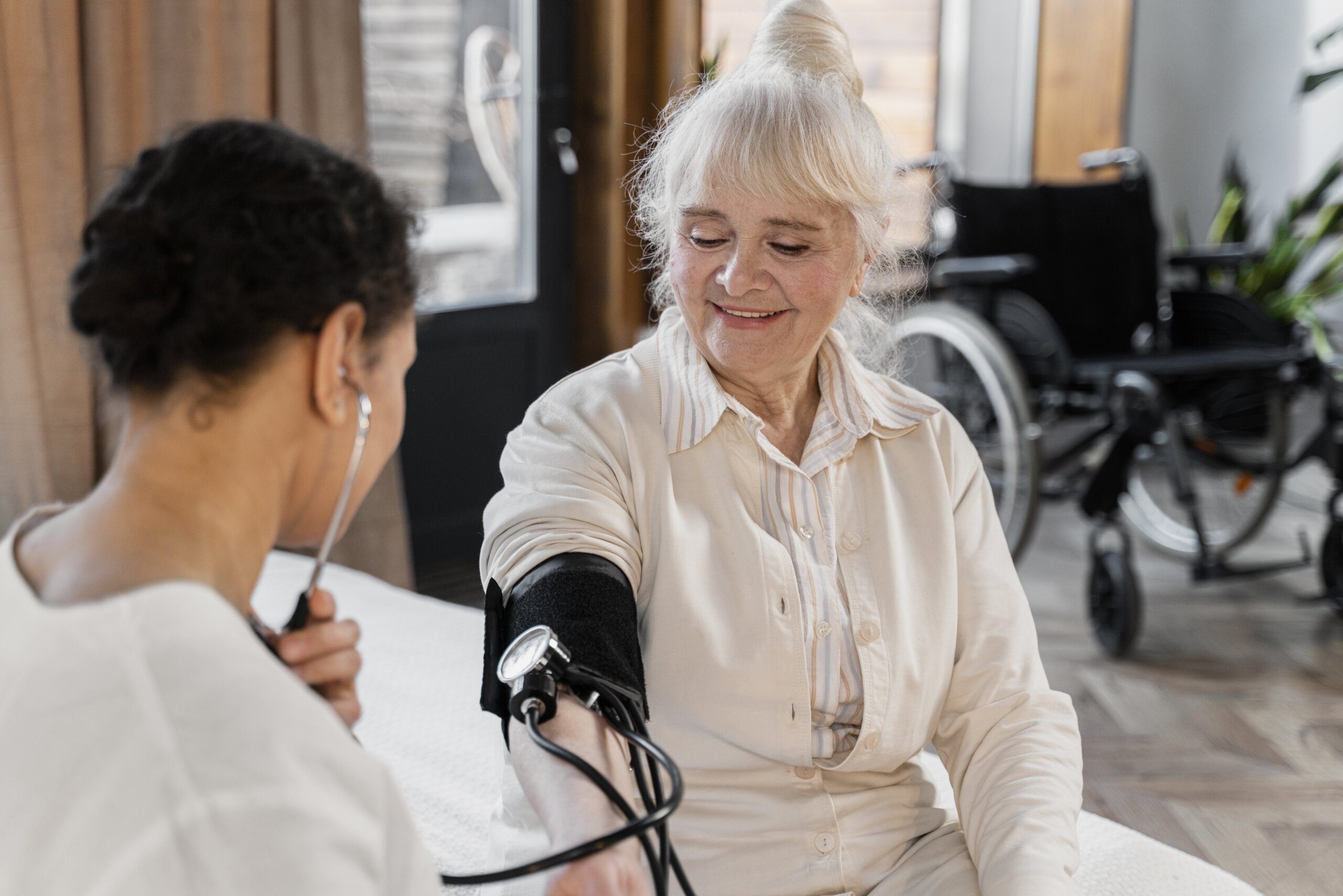 doctor-checking-blood-pressure-her-patient-scaled.jpg