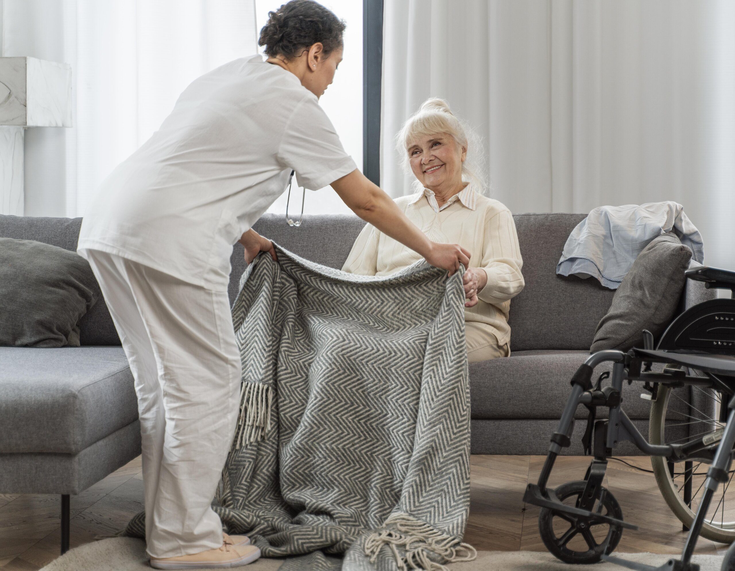 doctor-taking-care-senior-woman-home-1-scaled.jpg